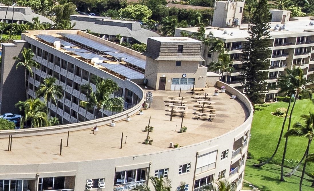 760 South Kihei Road, Unit 202 Kihei, HI 96753 - Photo 26 of 31 a view of a tall building with a swimming pool