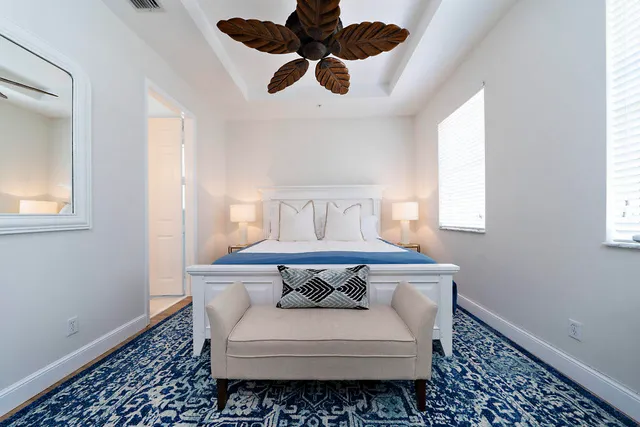a view of piano and wooden floor in a room