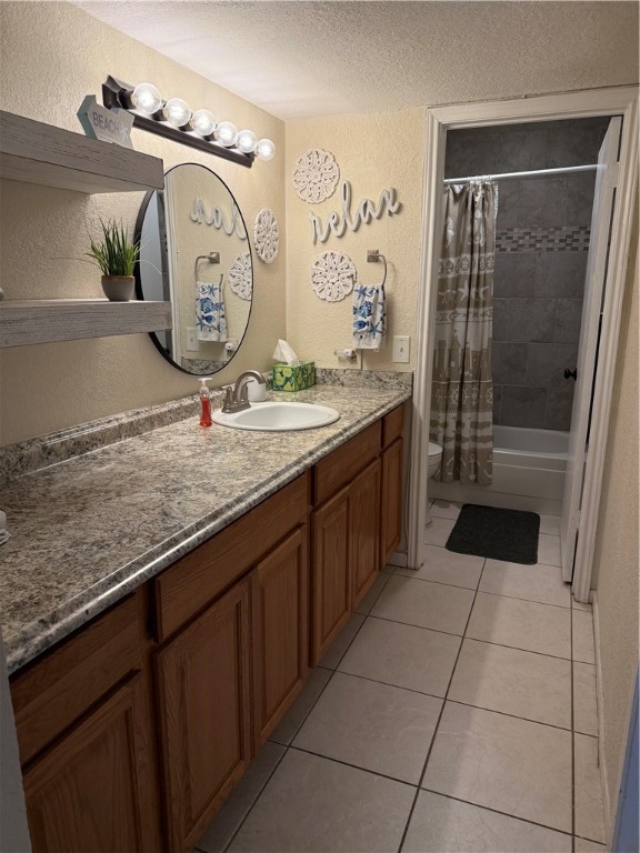 14428 Compass Street, Unit 101 Corpus Christi, TX 78418 - Photo 12 of 16 a bathroom with a granite countertop sink a mirror and shower