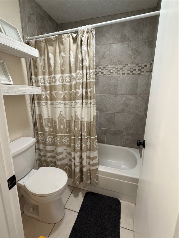 14428 Compass Street, Unit 101 Corpus Christi, TX 78418 - Photo 13 of 16 a bathroom with a toilet and a shower