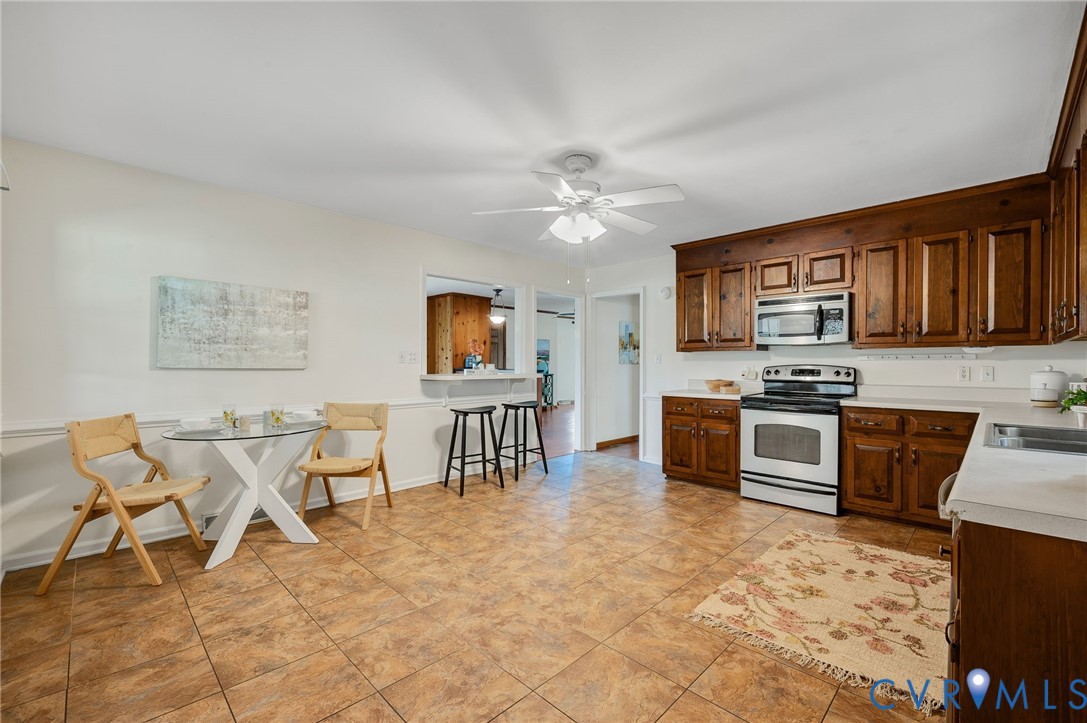 25205 Ritchie Avenue Petersburg, VA 23803 - Photo 10 of 30 Kitchen featuring wood cabinetry, a stainless stee