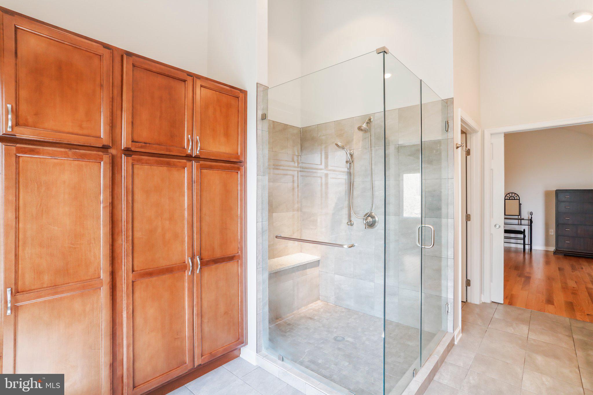 342 Moundbuilder Loop Hedgesville, WV 25427 - Photo 37 of 81 Custom Ceramic Tile Shower and Storage Space!