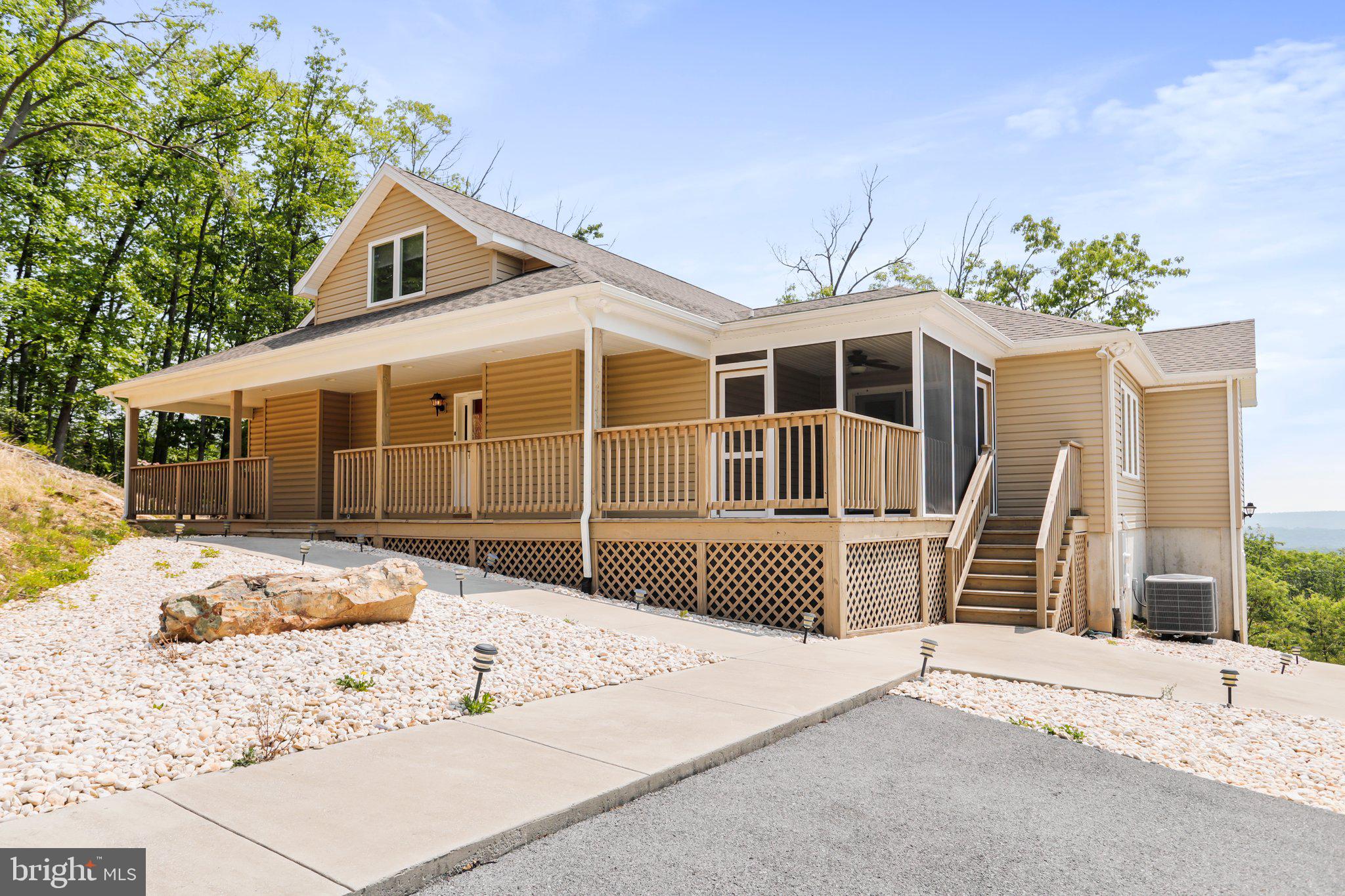 342 Moundbuilder Loop Hedgesville, WV 25427 - Photo 4 of 81 Large Open Deck & Cozy Screened in Porch!