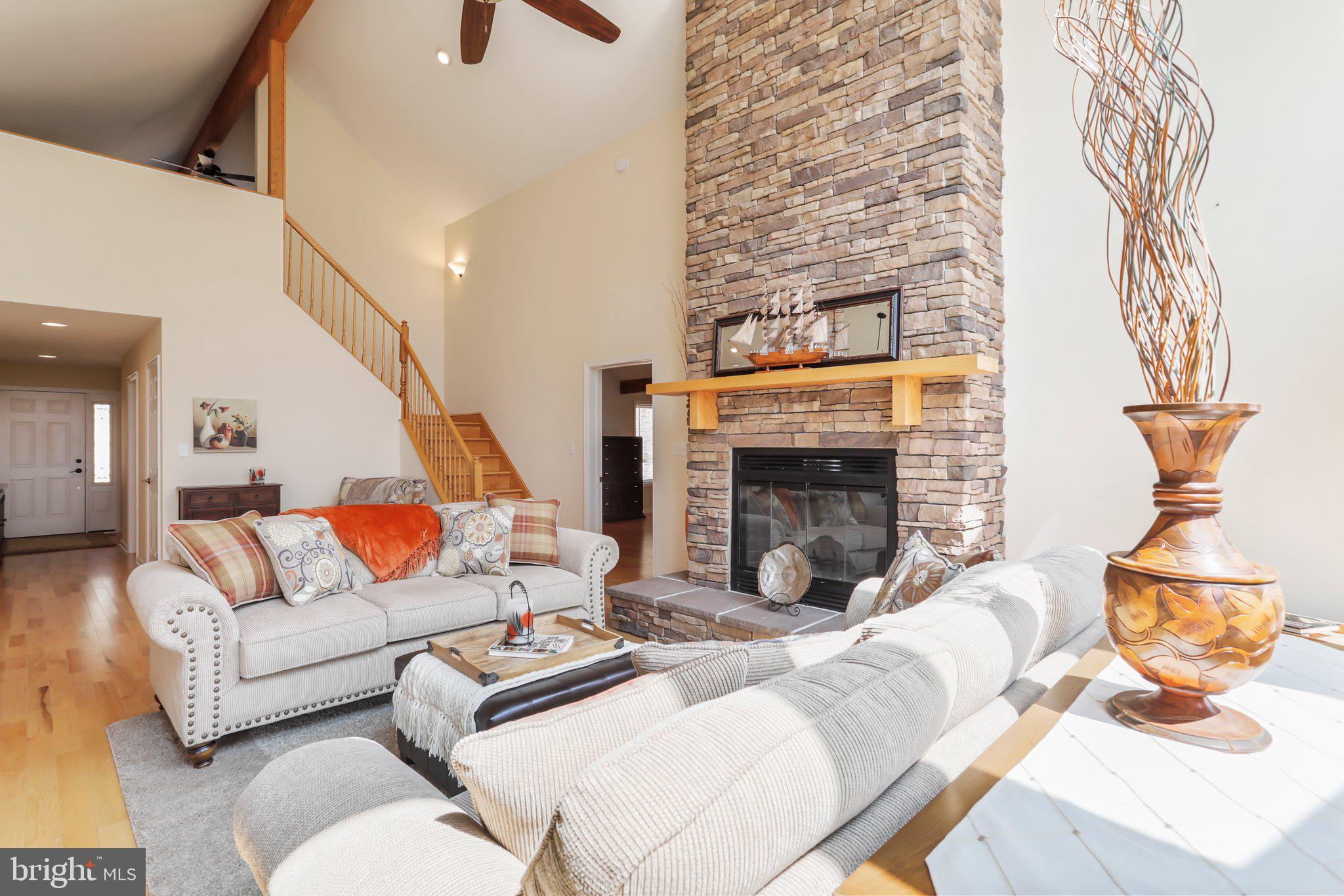 342 Moundbuilder Loop Hedgesville, WV 25427 - Photo 8 of 81 Gorgeous Wood Burning Fireplace in Great Room!