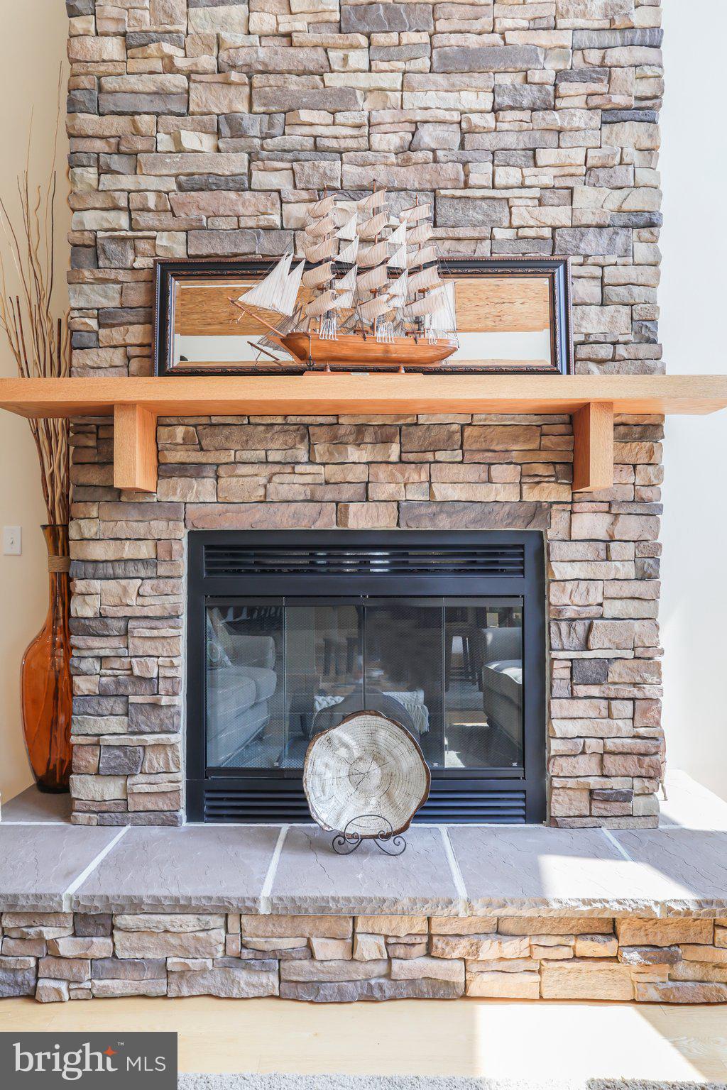 342 Moundbuilder Loop Hedgesville, WV 25427 - Photo 10 of 81 Floor to ceiling stone Wood Burning Fireplace