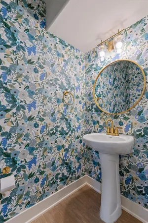 a bathroom with a sink and mirror