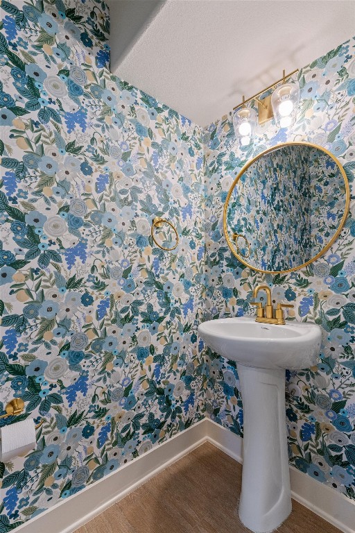 8707 Alderman Dr. Austin, TX 78747 - Photo 17 of 33 a bathroom with a sink and mirror