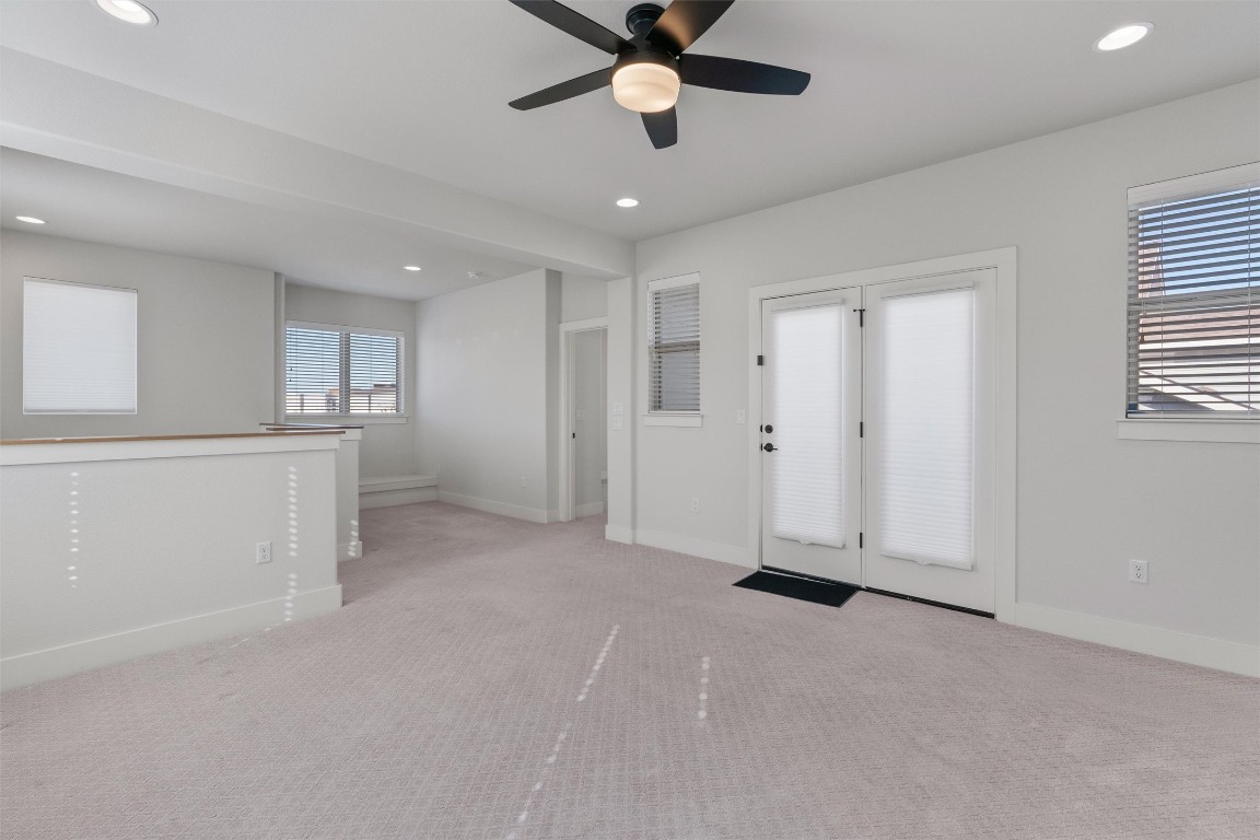 8707 Alderman Dr. Austin, TX 78747 - Photo 19 of 33 a view of empty room with ceiling fan
