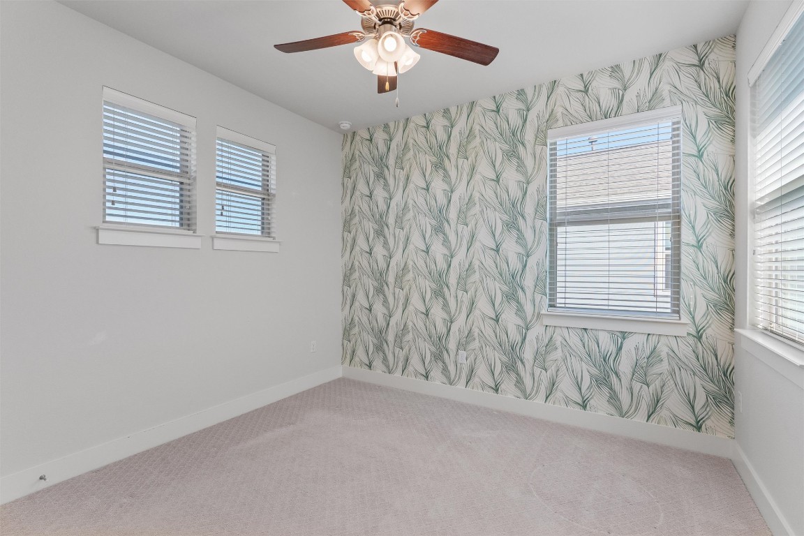 8707 Alderman Dr. Austin, TX 78747 - Photo 21 of 33 a view of an empty room with a window