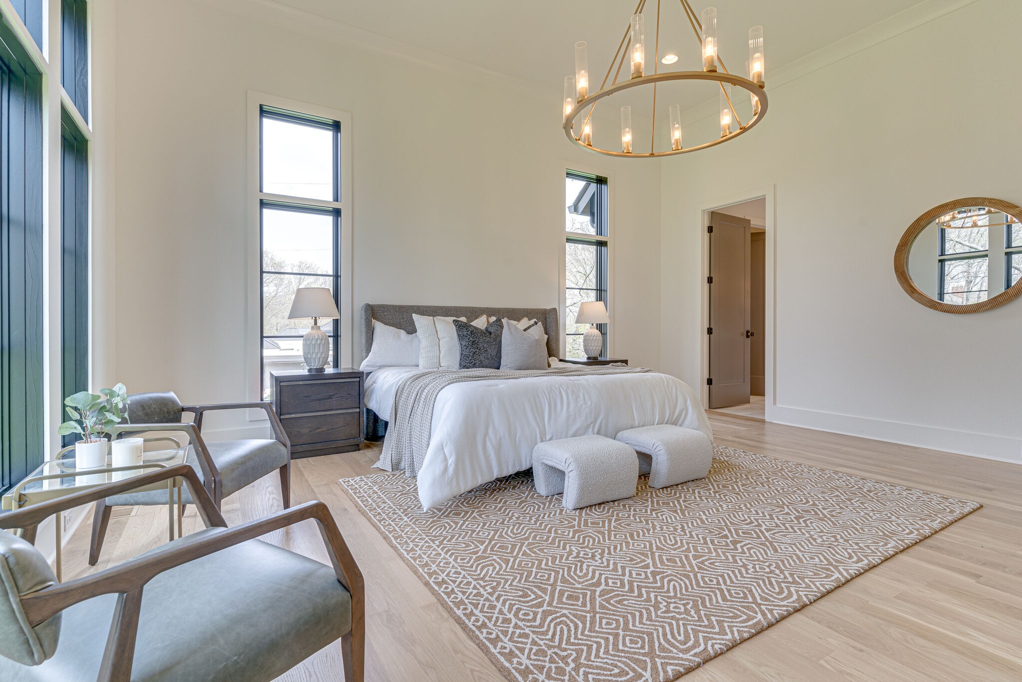 6212 Hickory Valley Road Nashville, TN 37205 - Photo 20 of 41 a bedroom with a bed and a chandelier