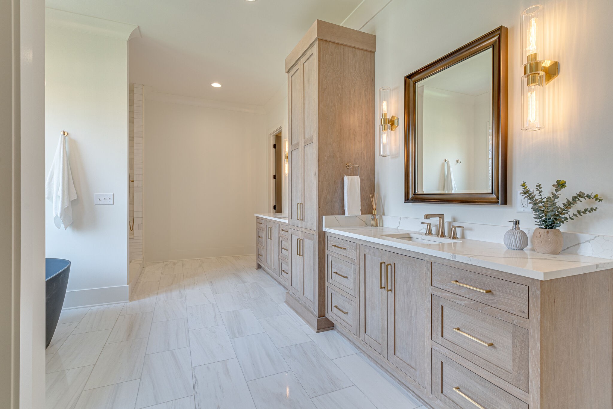 6212 Hickory Valley Road Nashville, TN 37205 - Photo 21 of 41 a spacious bathroom with a double vanity sink a mirror and a shower