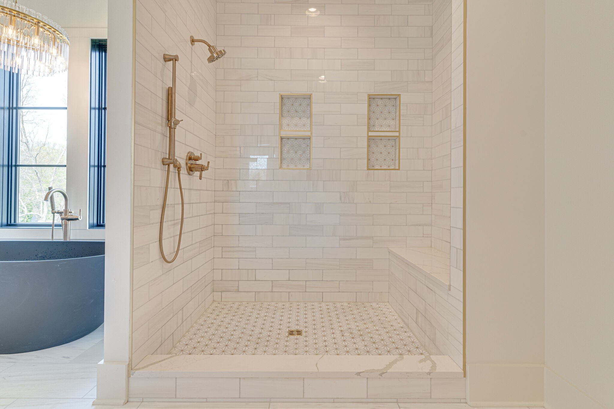6212 Hickory Valley Road Nashville, TN 37205 - Photo 22 of 41 a bathroom with a glass shower door