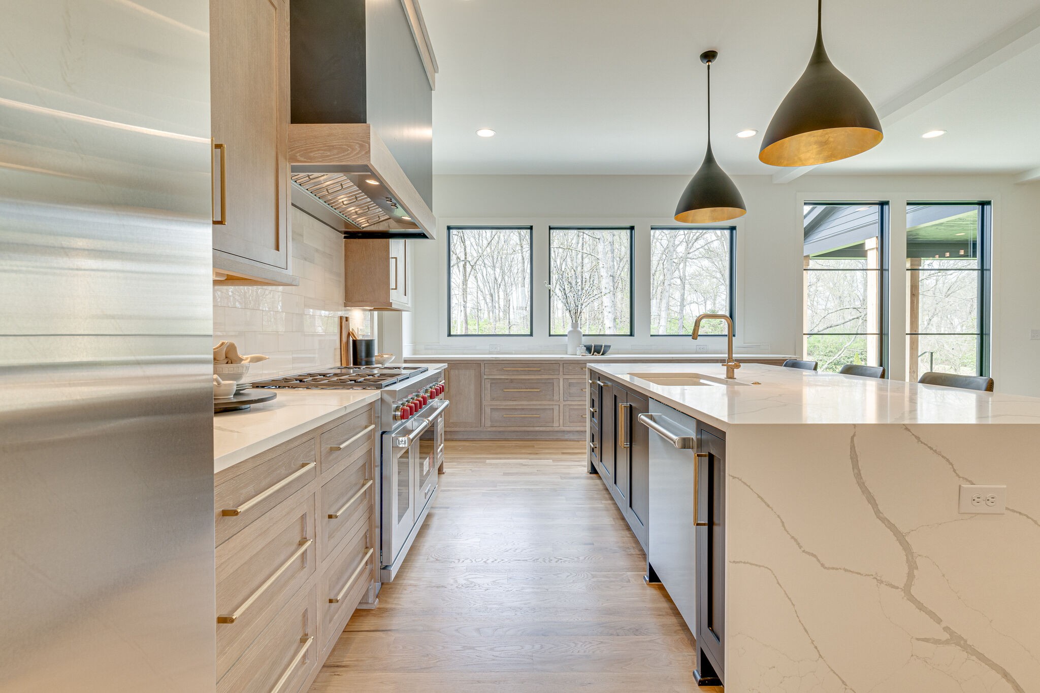 6212 Hickory Valley Road Nashville, TN 37205 - Photo 40 of 41 a large kitchen with a large window and stainless steel appliances