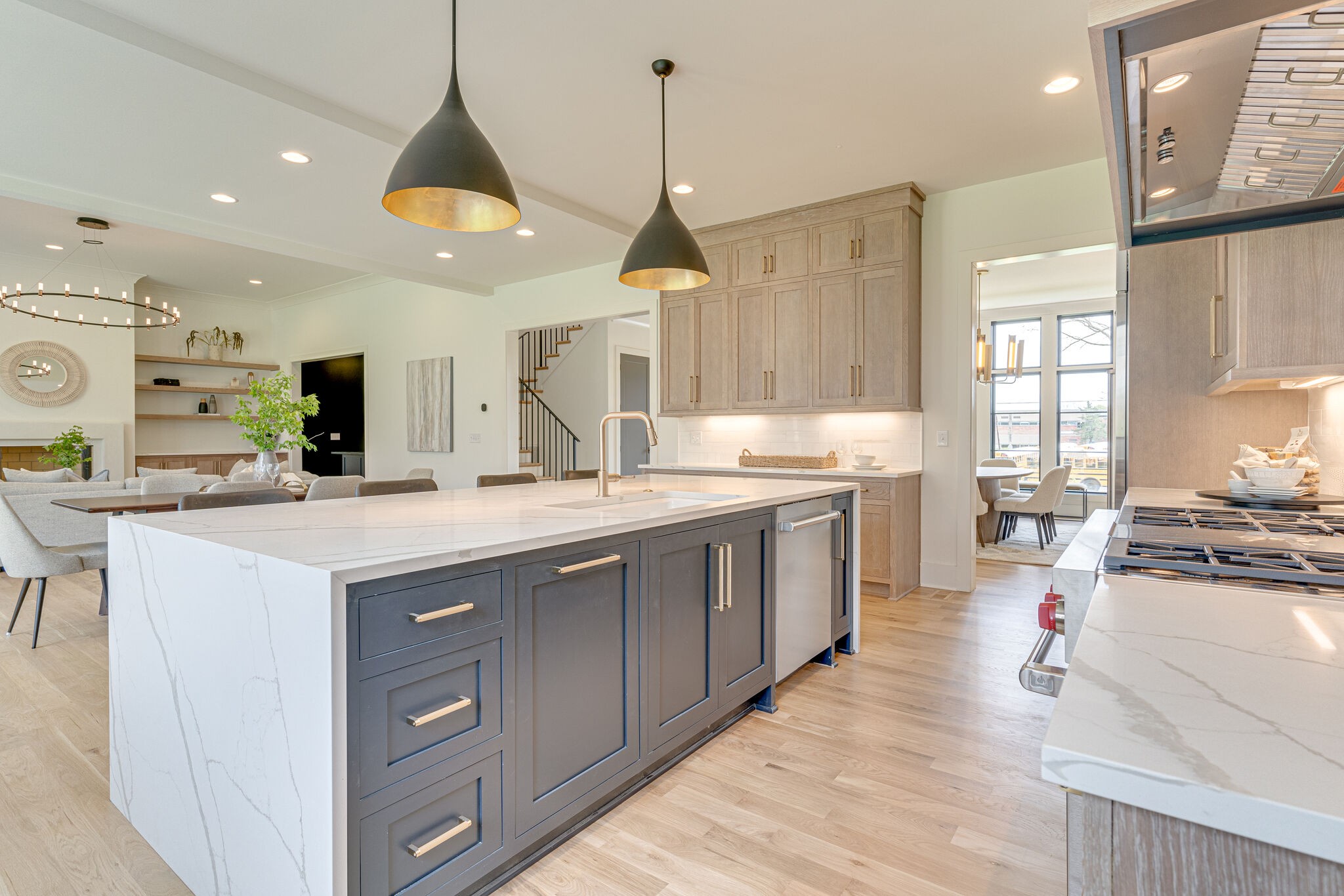 6212 Hickory Valley Road Nashville, TN 37205 - Photo 10 of 41 a kitchen with counter top space sink and a chandelier