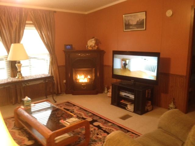 645 Cook Road Portland, TN 37148 - Photo 11 of 20 This gas fireplace will heat the entire home. Cozy and warm evenings sitting by the TV with your family.