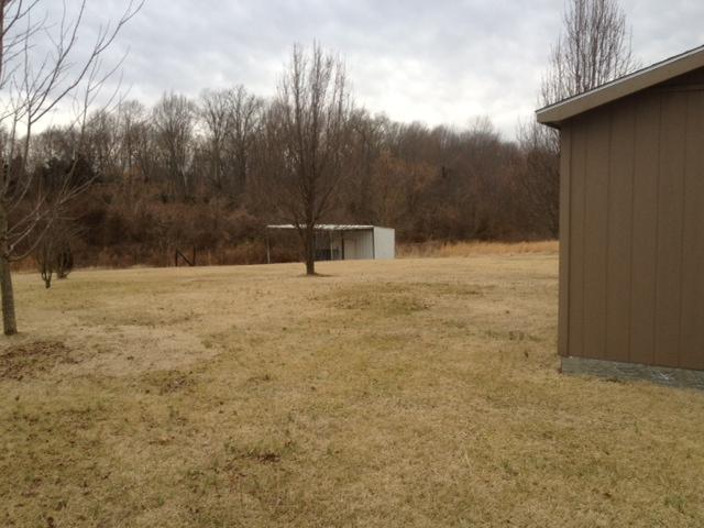 645 Cook Road Portland, TN 37148 - Photo 7 of 20 Another out building way in the back. This back of this property is wooded.