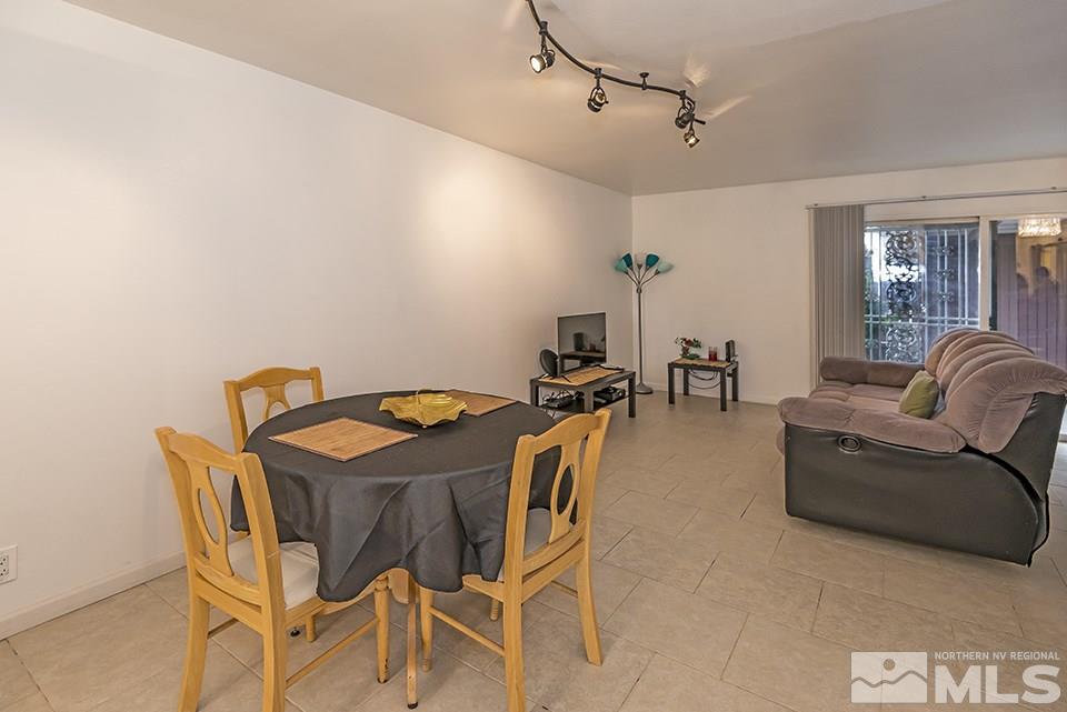 60 Smithridge Park Reno, NV 89502 - Photo 4 of 15 a dining room with furniture and window