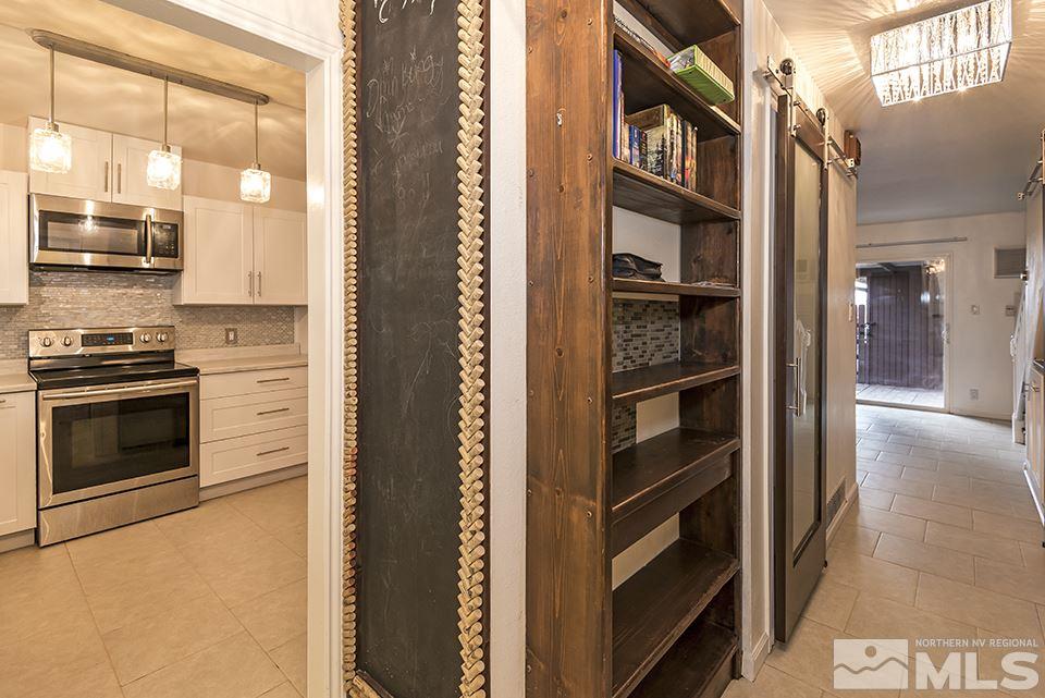 60 Smithridge Park Reno, NV 89502 - Photo 7 of 15 a view of an entryway and livingroom with furniture