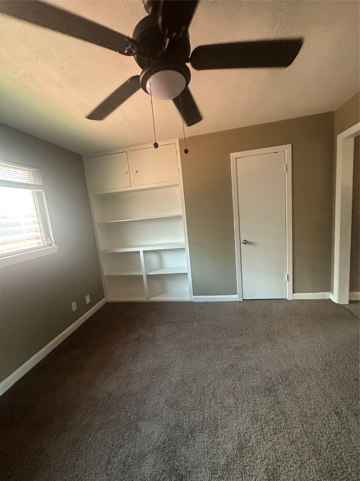 5908 Ardmore Street, Unit 18 Houston, TX 77021 - Photo 6 of 9 a view of an empty room with a window