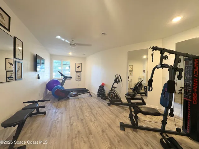 a view of a room with gym equipment