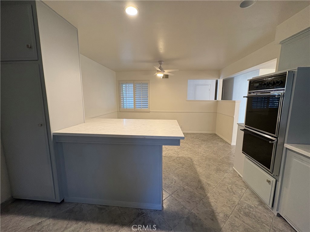 11911 East Cherry Los Alamitos, CA 90720 - Photo 4 of 12 a kitchen with stainless steel appliances a refrigerator and a sink