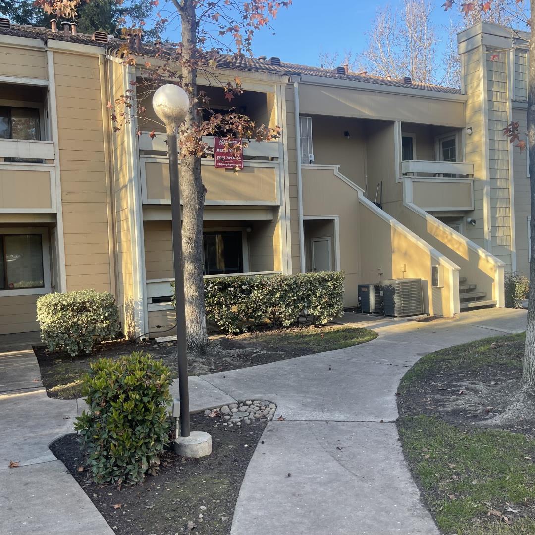 1645 Pyrenees Avenue, Unit 63 Stockton, CA 95210 - Photo 13 of 17 a front view of a house with yard
