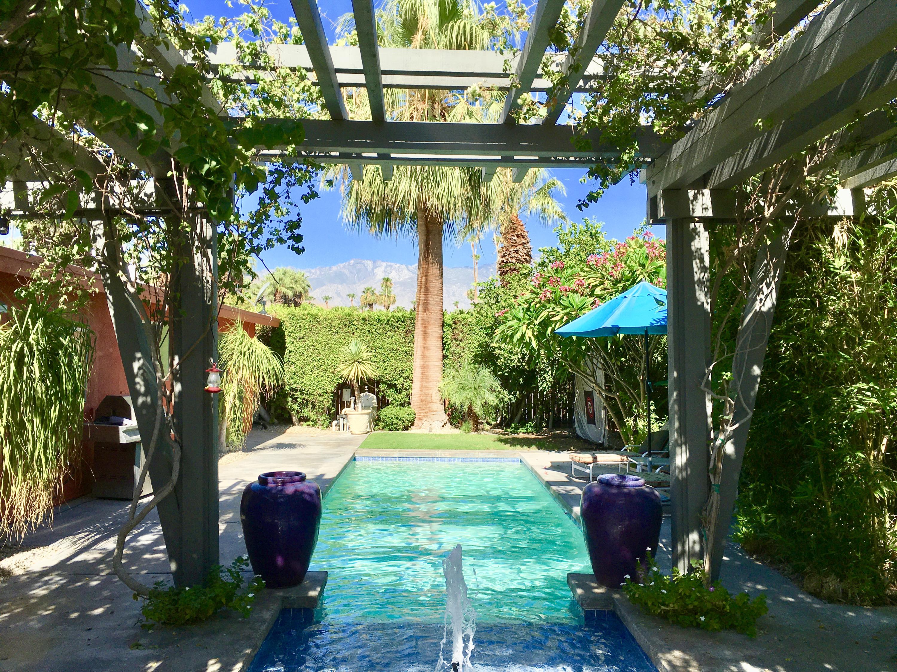 70110 Chappel Road Rancho Mirage, CA 92270 - Photo 1 of 26 a view of swimming pool with lawn chairs and plants