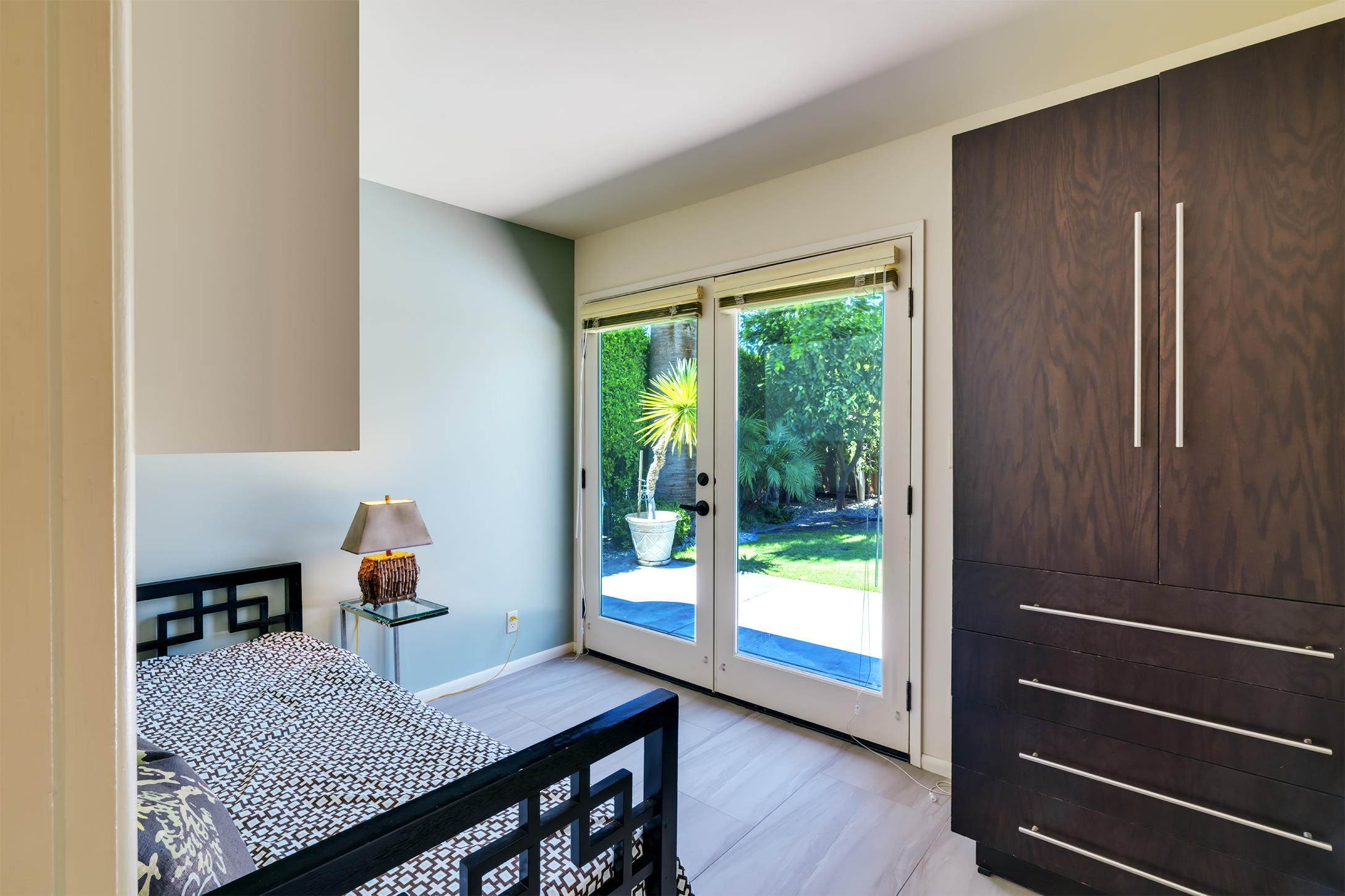 70110 Chappel Road Rancho Mirage, CA 92270 - Photo 15 of 26 a view of a dining room with furniture window and wooden floor