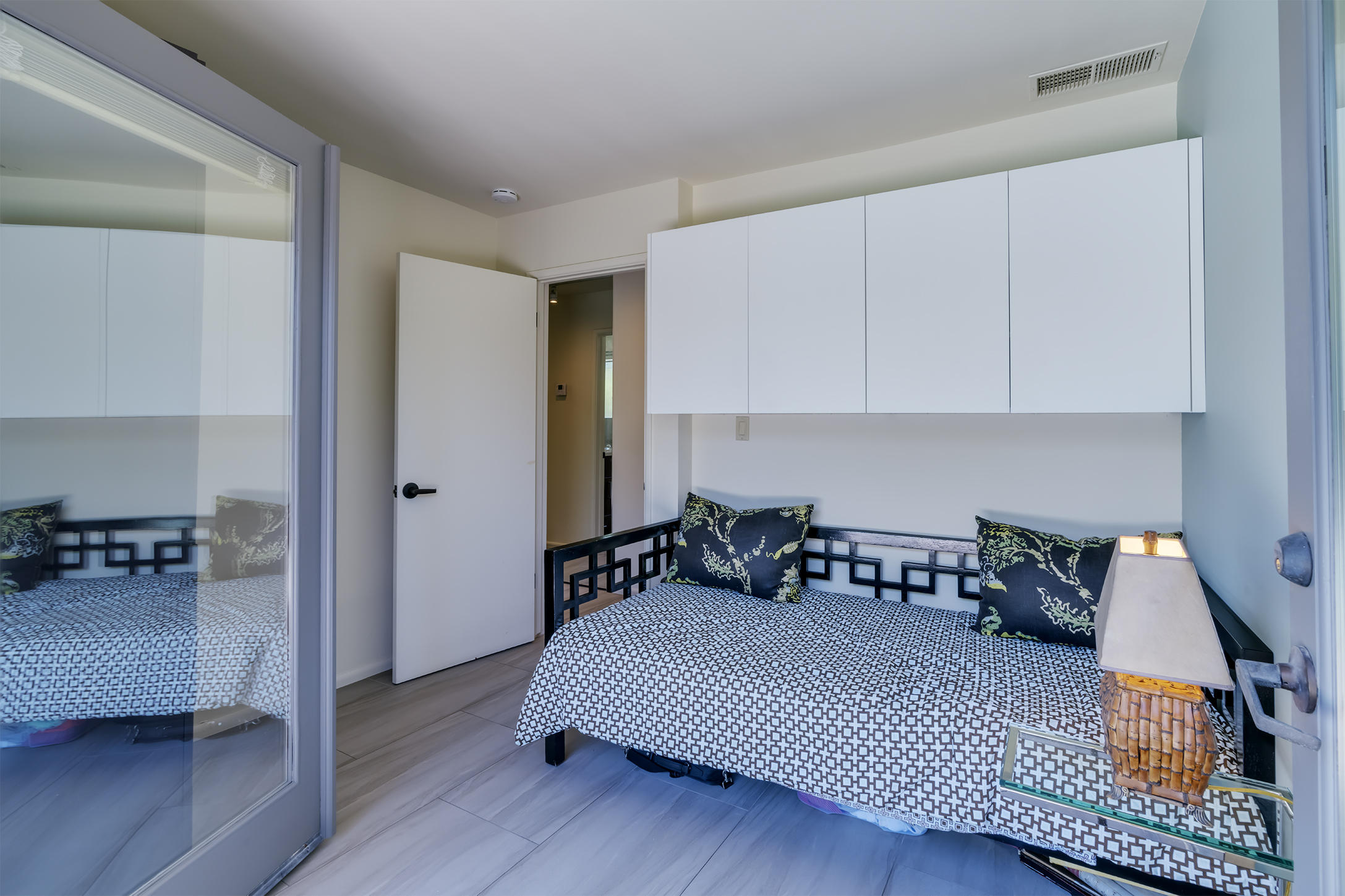 70110 Chappel Road Rancho Mirage, CA 92270 - Photo 16 of 26 a bedroom with furniture and a wooden floor