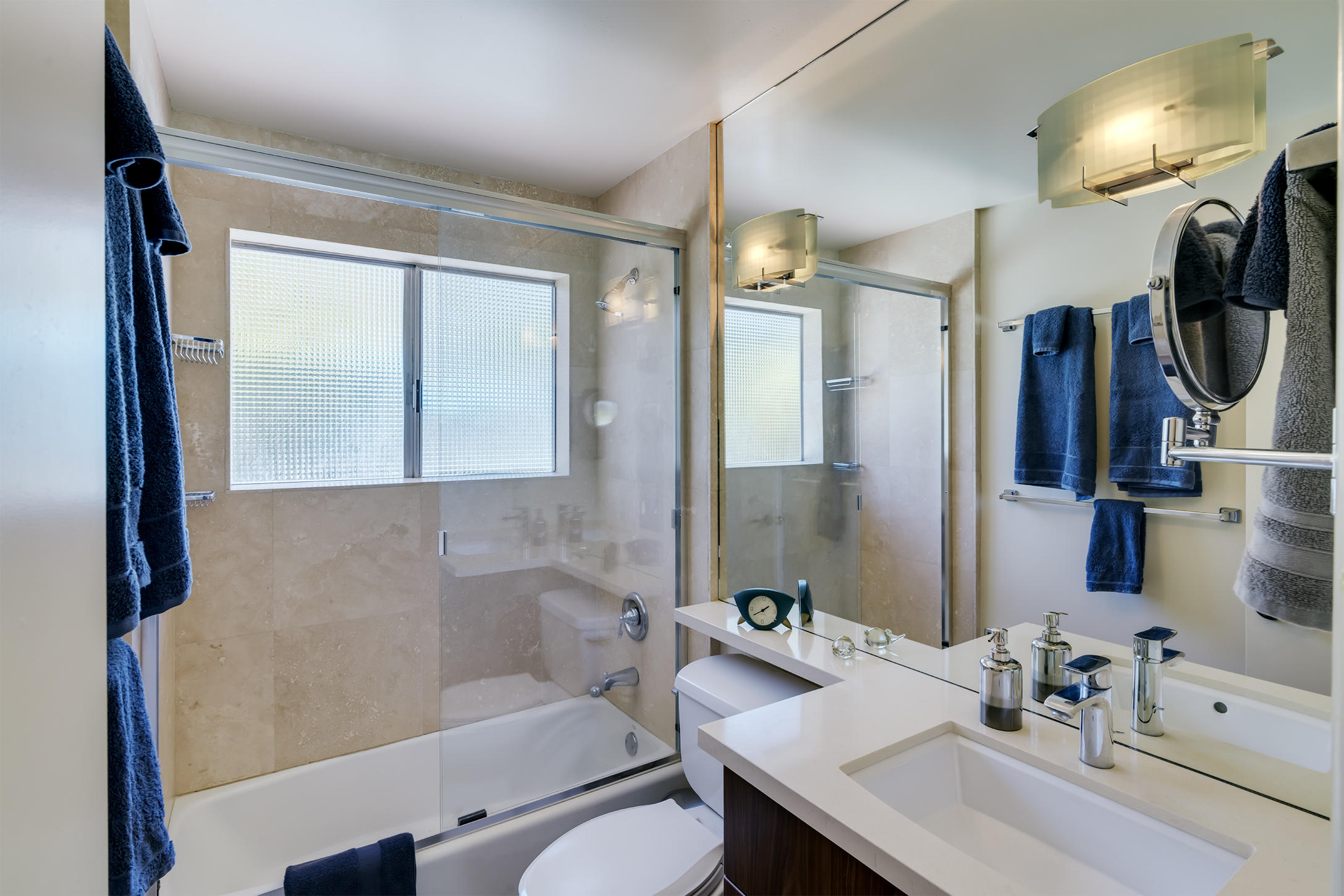 70110 Chappel Road Rancho Mirage, CA 92270 - Photo 17 of 26 a bathroom with a sink toilet and shower
