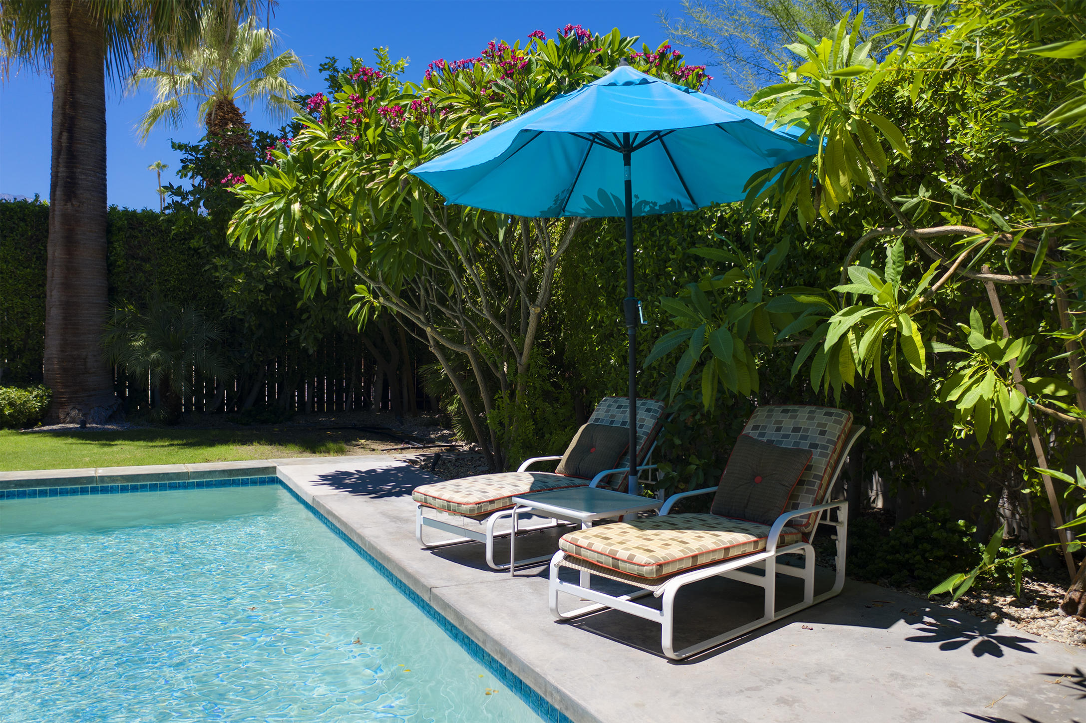 70110 Chappel Road Rancho Mirage, CA 92270 - Photo 24 of 26 a view of a backyard with sitting area and furniture