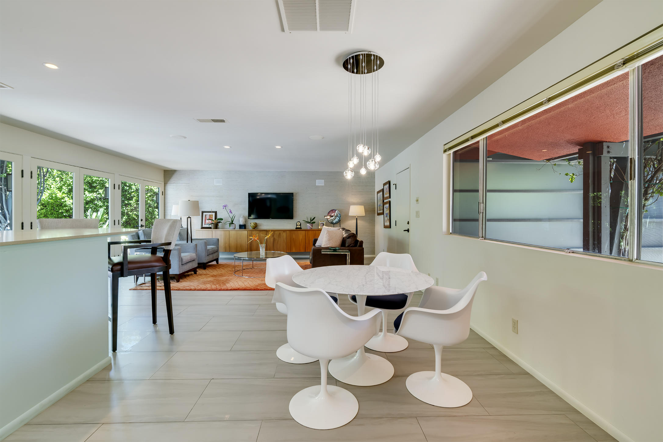 70110 Chappel Road Rancho Mirage, CA 92270 - Photo 4 of 26 a view of a dining room with furniture window and outside view