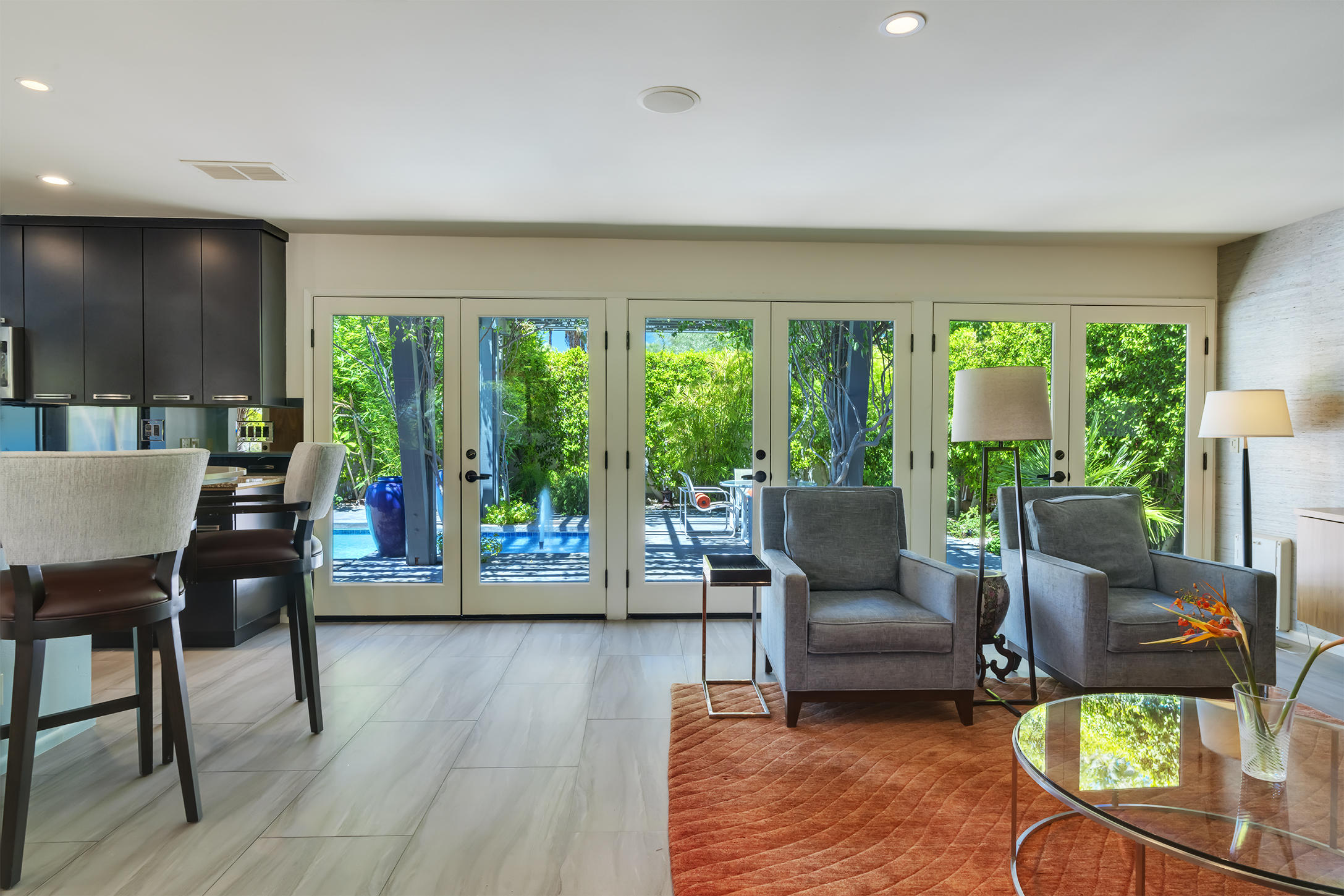 70110 Chappel Road Rancho Mirage, CA 92270 - Photo 6 of 26 a living room with furniture and a large window