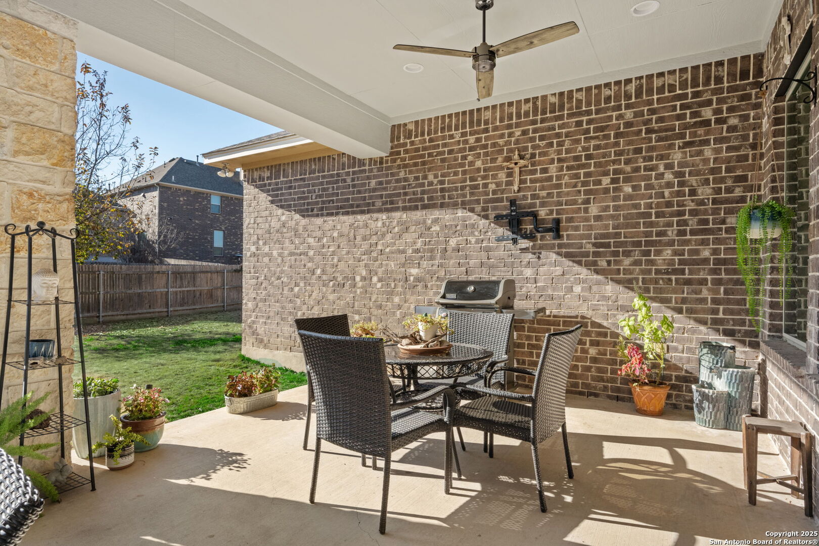 28827 Pfeiffers Gate Fair Oaks Ranch, TX 78015 - Photo 30 of 36 a view of a patio with a table and chairs