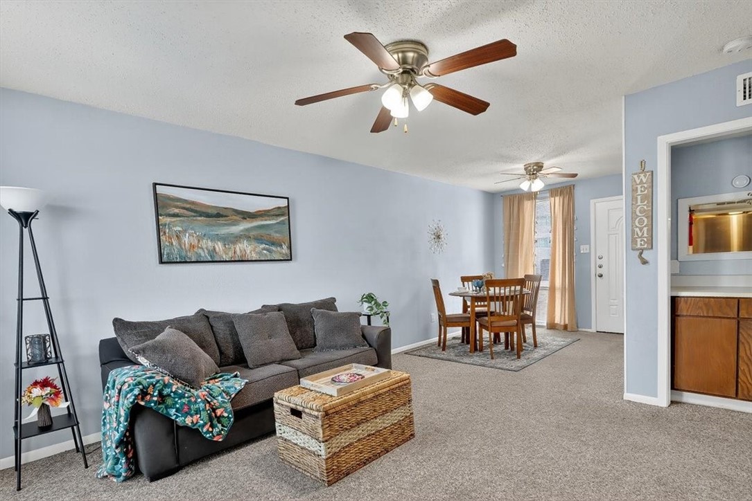 3402 Ocean Drive Corpus Christi, TX 78411 - Photo 16 of 39 a living room with furniture and a dining table