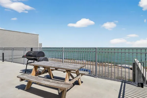 a view of a balcony with chair