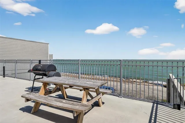 a view of a balcony with chair