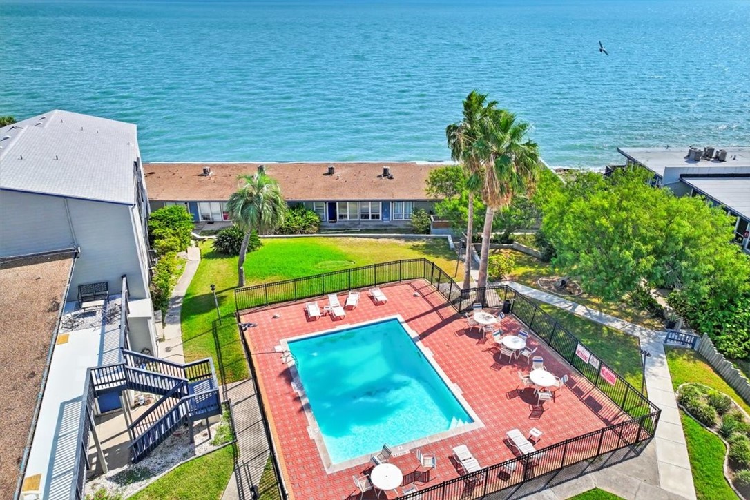 3402 Ocean Drive Corpus Christi, TX 78411 - Photo 38 of 39 an aerial view of a house with outdoor space pool seating area and covered with green space