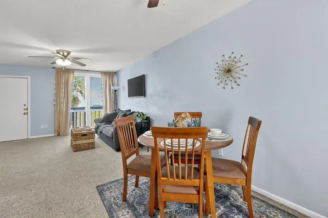 a view of a dining room with furniture