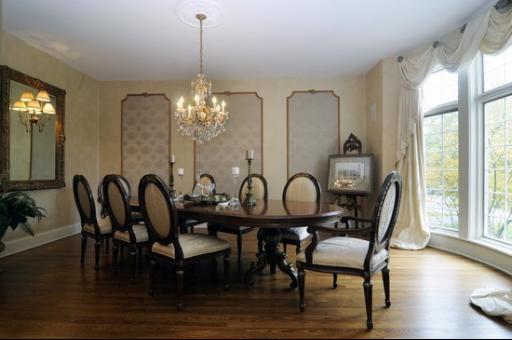 13 Riderwood Road North Barrington, IL 60010 - Photo 4 of 16 a view of a dining room with furniture window and wooden floor