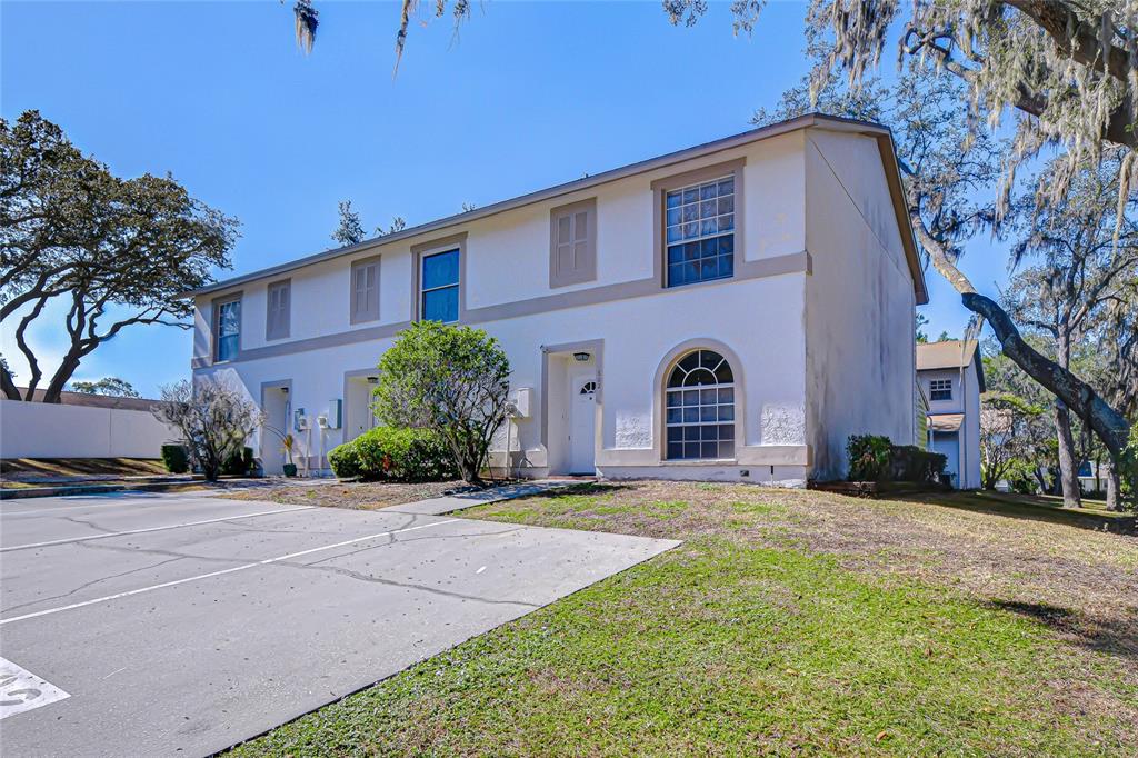 602 Fieldcrest Drive Brandon, FL 33511 - Photo 1 of 23 a front view of a house with a yard and garage