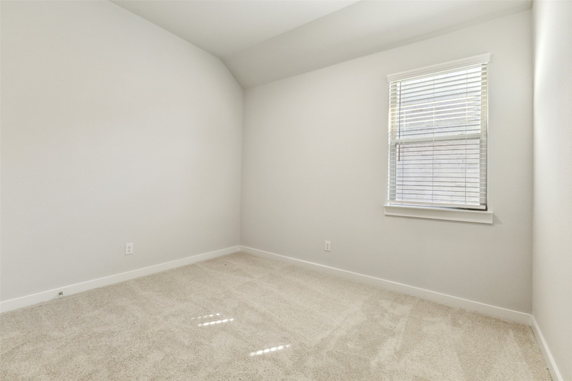 153 Tolo Drive Elgin, TX 78621 - Photo 16 of 25 an empty room with a window