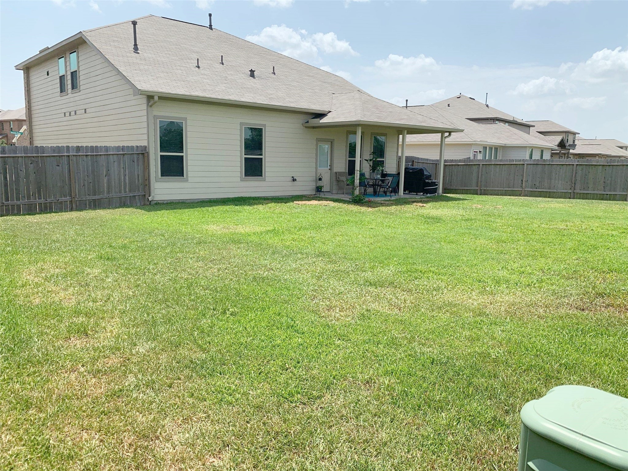 9931 Swindale Ridge Lane Houston, TX 77044 - Photo 26 of 29 a front view of house with yard and seating area