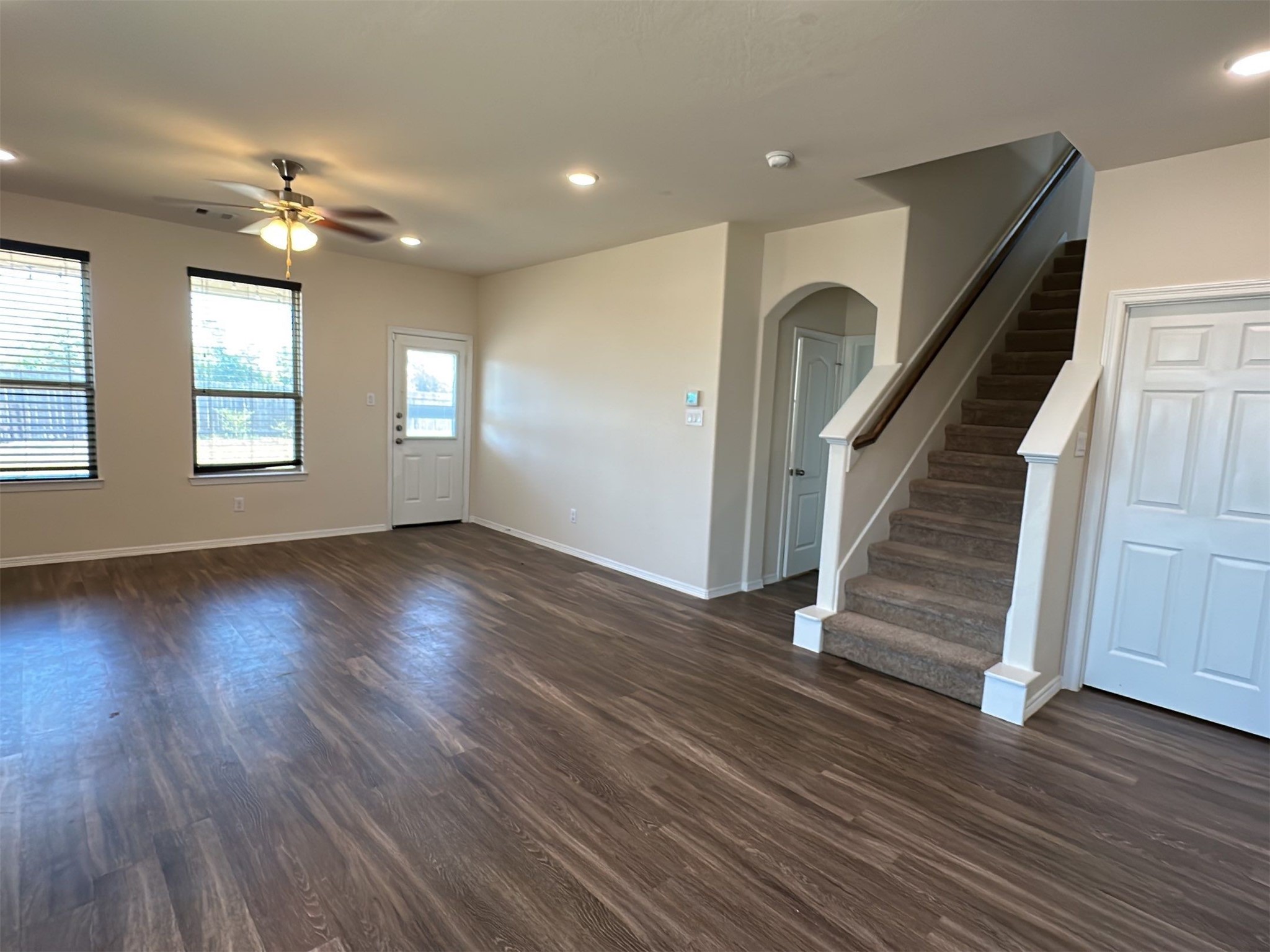 9931 Swindale Ridge Lane Houston, TX 77044 - Photo 10 of 29 wooden floor in an empty room with a window