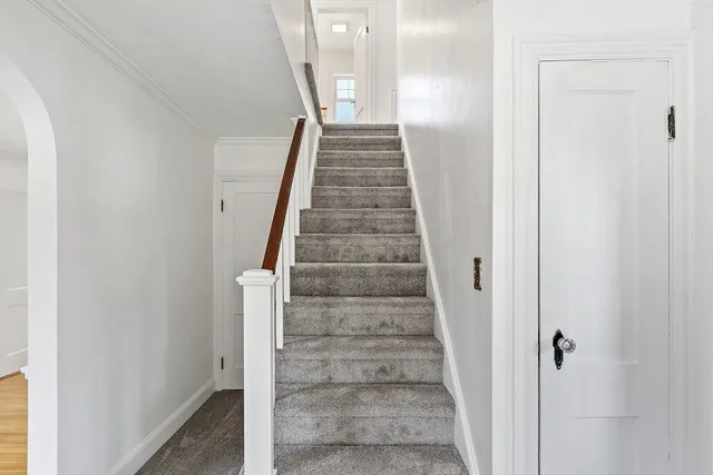 a view of entryway with stairs