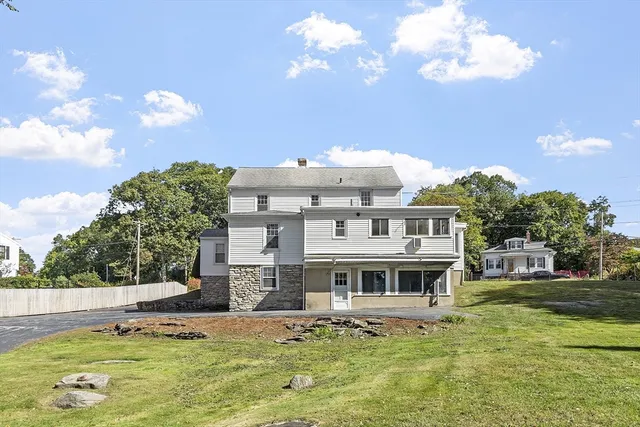 a view of a house with a big yard