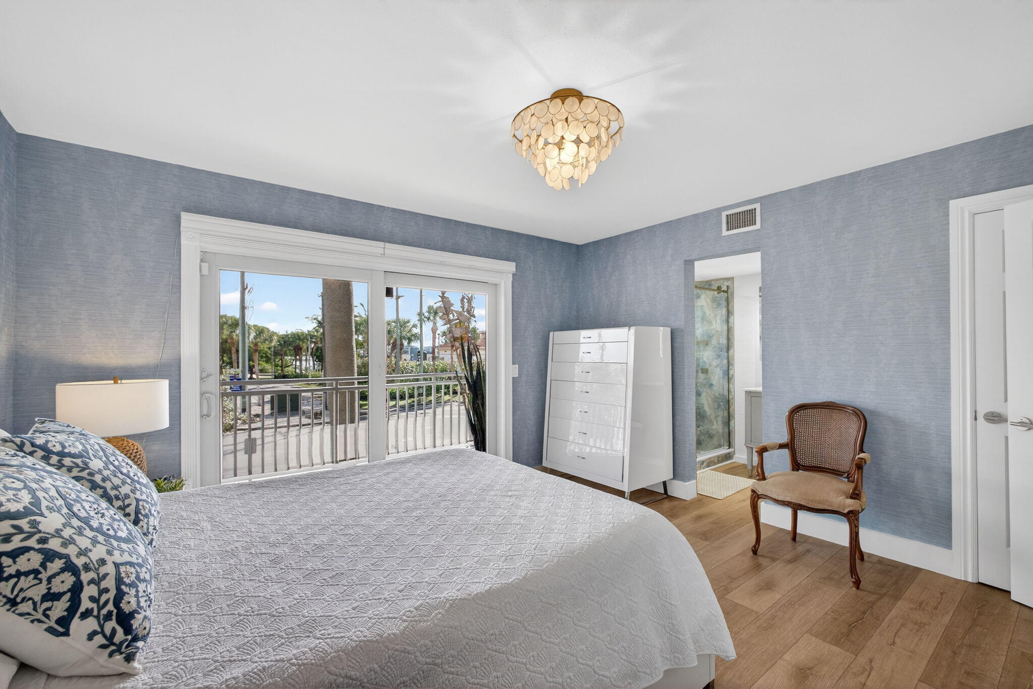 129 South Golfview Road, Unit 6 Lake Worth Beach, FL 33460 - Photo 13 of 51 a bedroom with a bed and a chair