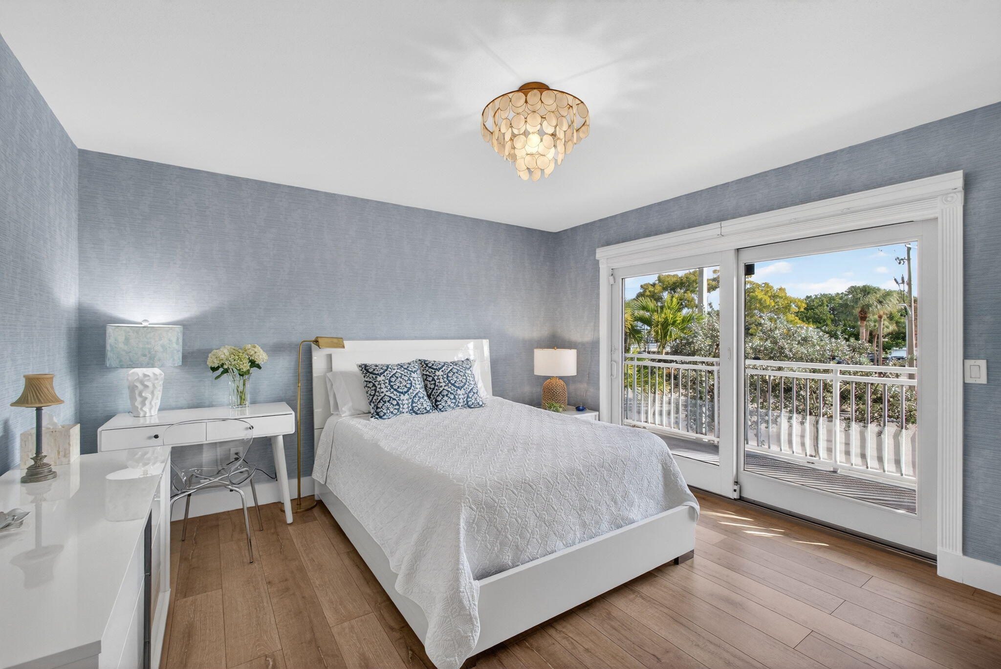 129 South Golfview Road, Unit 6 Lake Worth Beach, FL 33460 - Photo 14 of 51 a bedroom with a bed and a large window