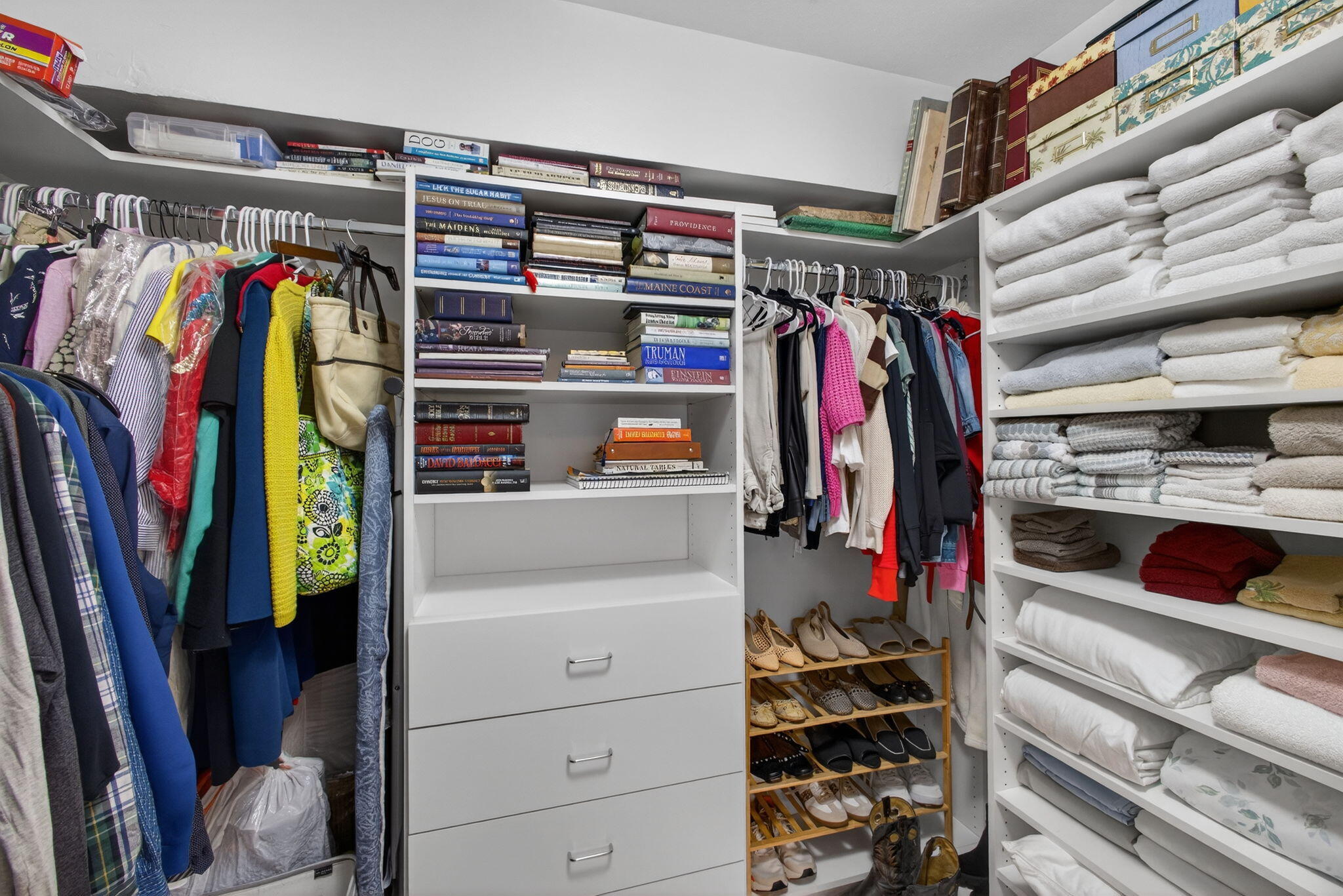 129 South Golfview Road, Unit 6 Lake Worth Beach, FL 33460 - Photo 19 of 51 a view of walk in closet with clothes and shoes