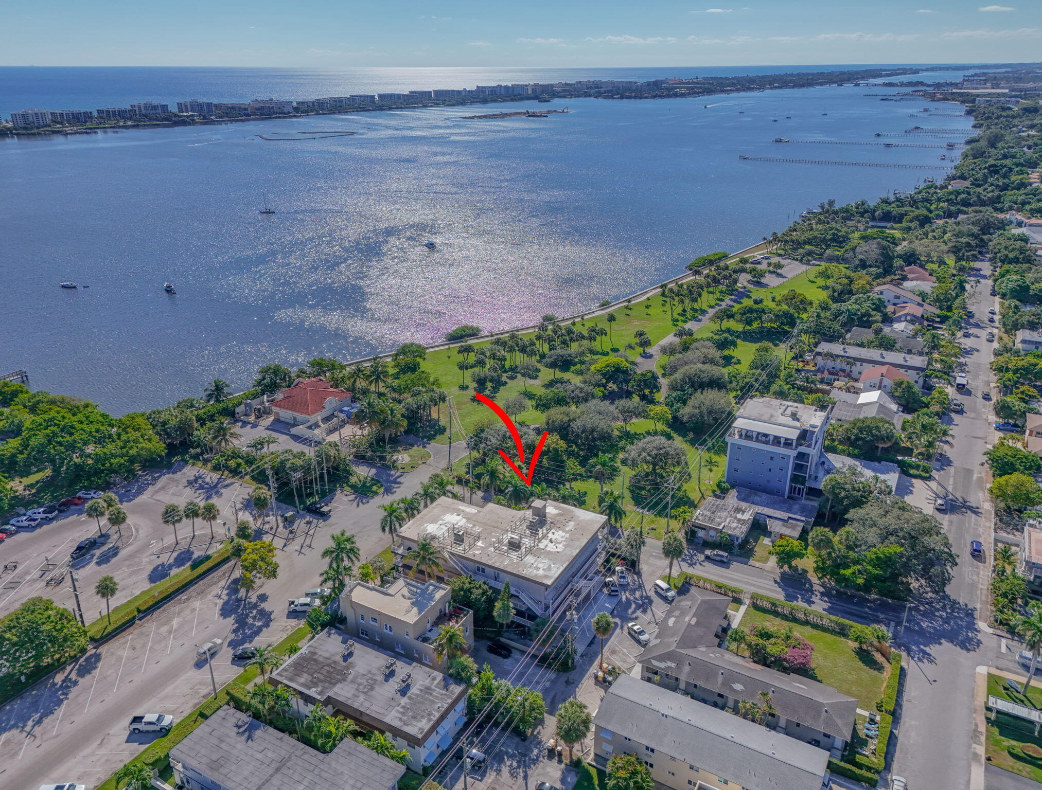 129 South Golfview Road, Unit 6 Lake Worth Beach, FL 33460 - Photo 2 of 51 an aerial view of a house with a garden